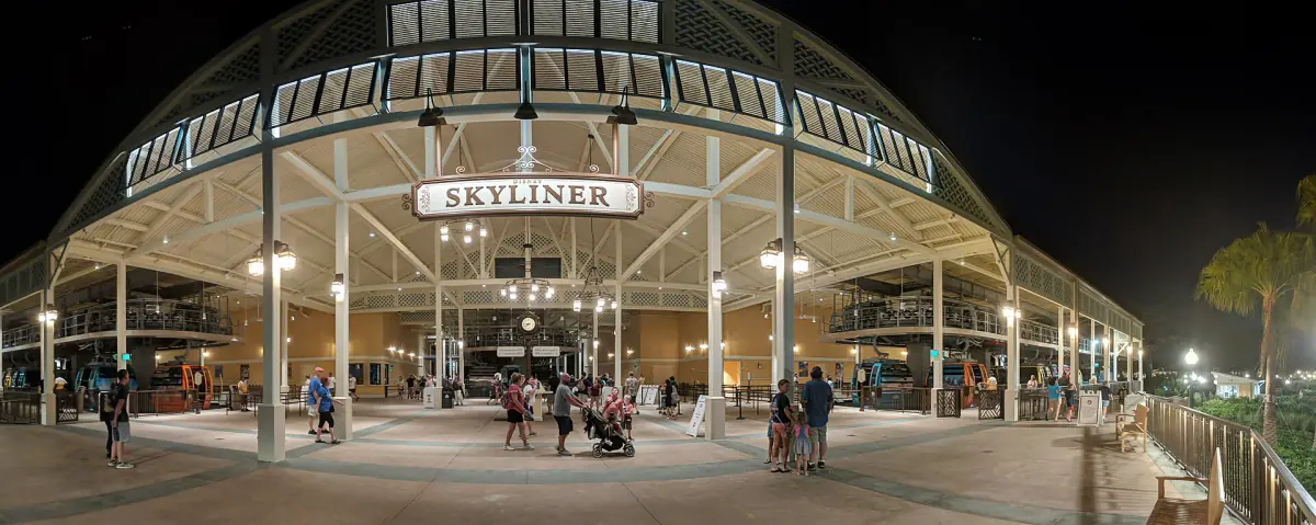 A Disney Skyliner gondola station at night