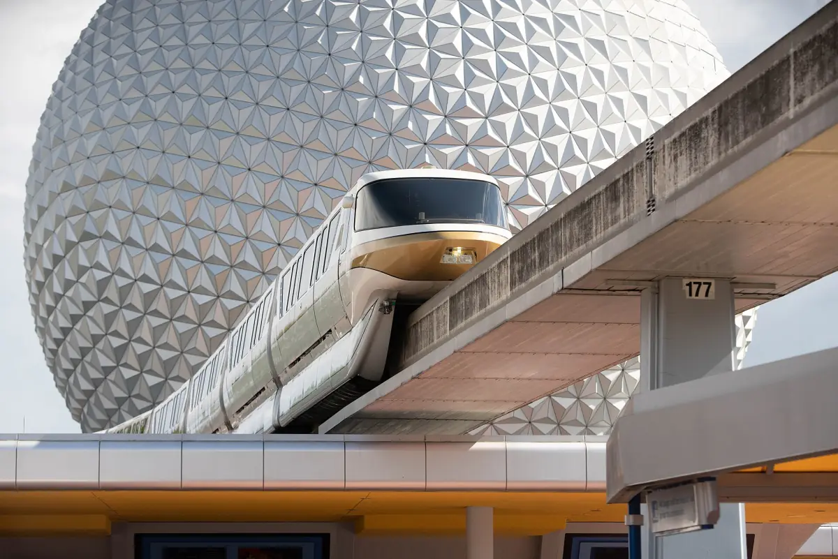 A monorail passing Spaceship Earth